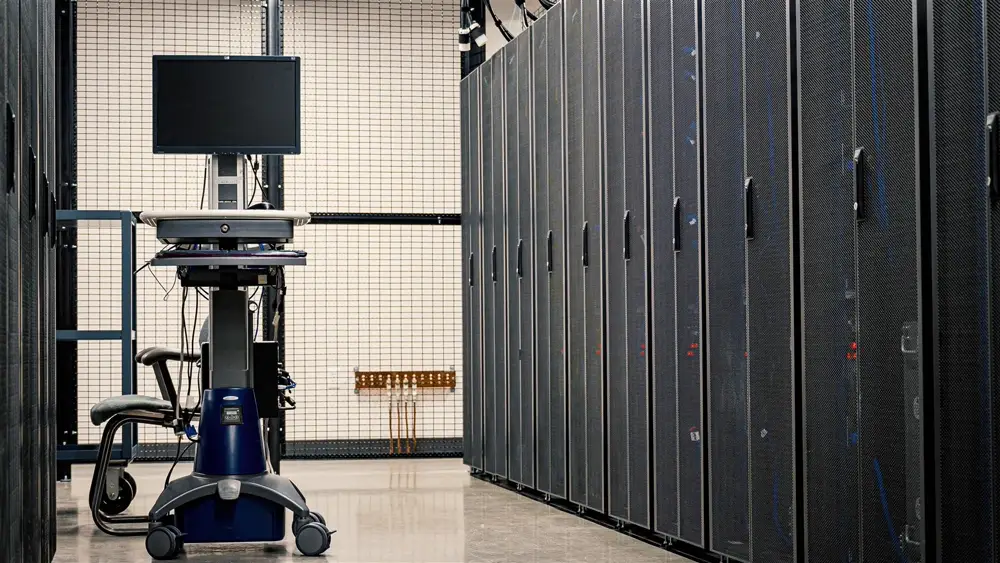 Server room data center with rows of network racks